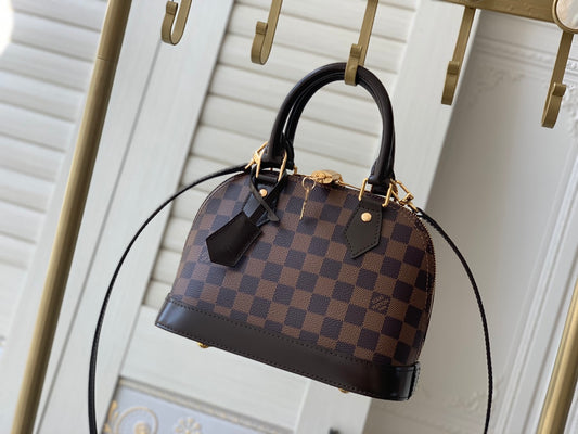 BOLSA LV ALMA BB 25